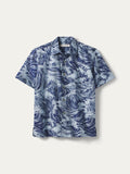 Blue and white ocean wave-print short-sleeve button-up shirt, front view.