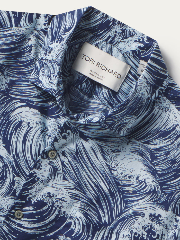 Blue and white wave-pattern cotton shirt, partially unbuttoned with visible Tori Richard collar label.