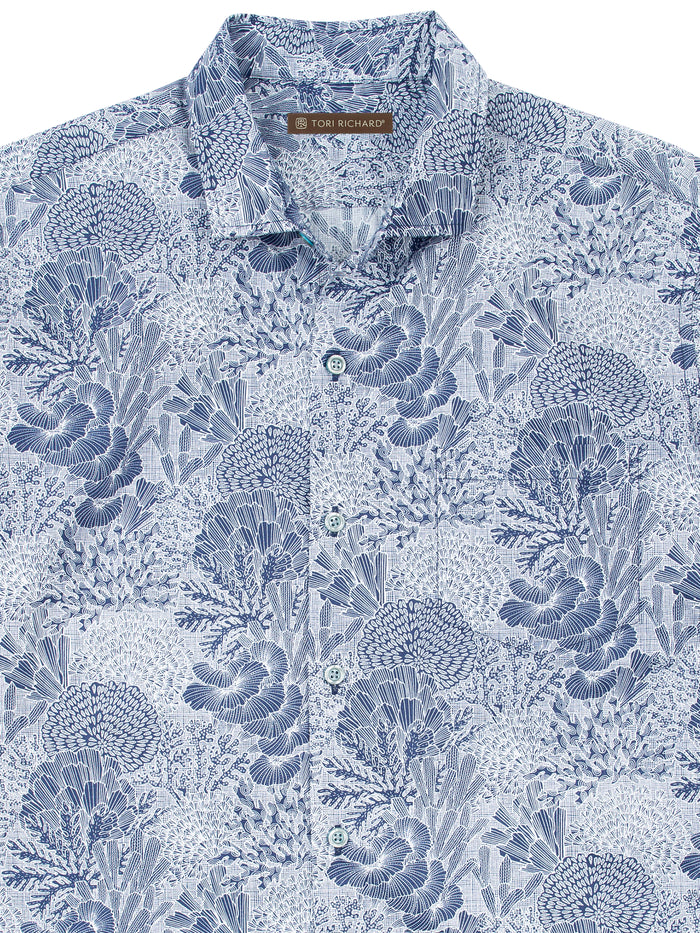 Blue and white floral-leaf cotton shirt, intricate pattern, lightweight fabric, front view.