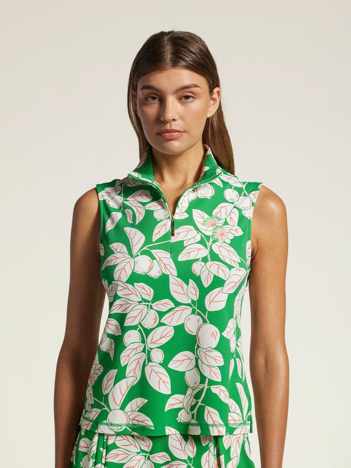 Green and pink leaf-print sleeveless top in moisture-wicking fabric, front view.