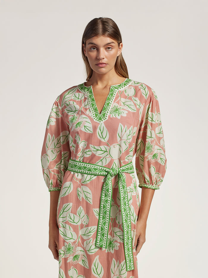 Pink and green guava print caftan, midi length, sash waist tie, front view.