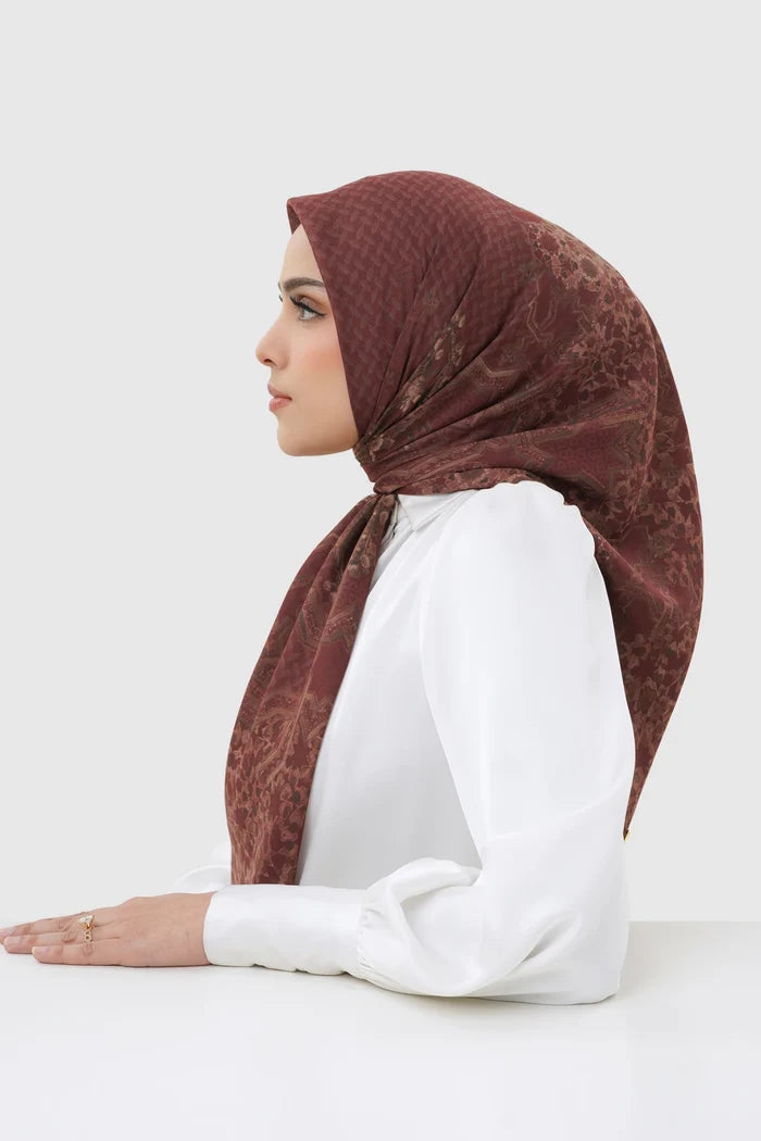 haramain 2 printed square scarf in oud red by buttonscarves side view