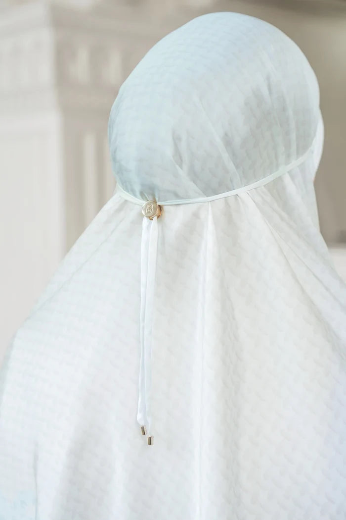haramain2 prayer robe in holy by buttonscarves back view close-up