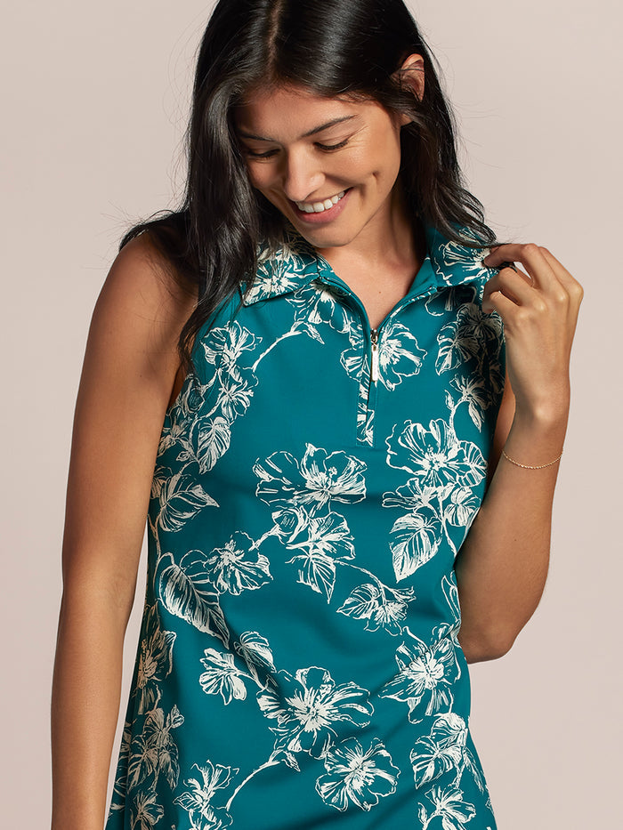 Teal floral-print dress, sleeveless, front view showing UPF sun protection fabric technology.