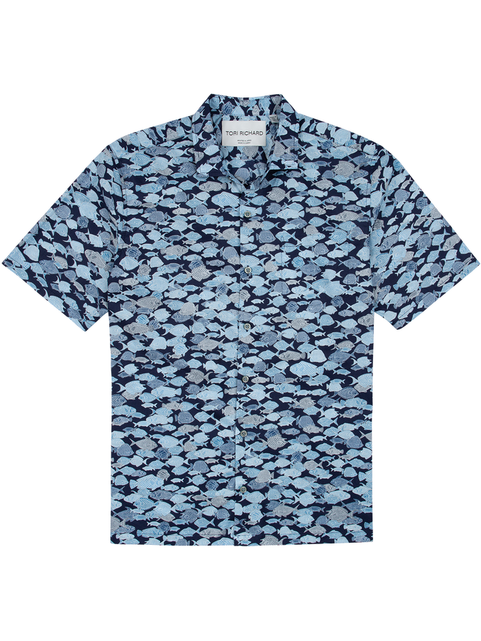 Blue Hawaiian cotton short-sleeve shirt, blue fish print, collar, flat lay front view. Tori Richard label visible.