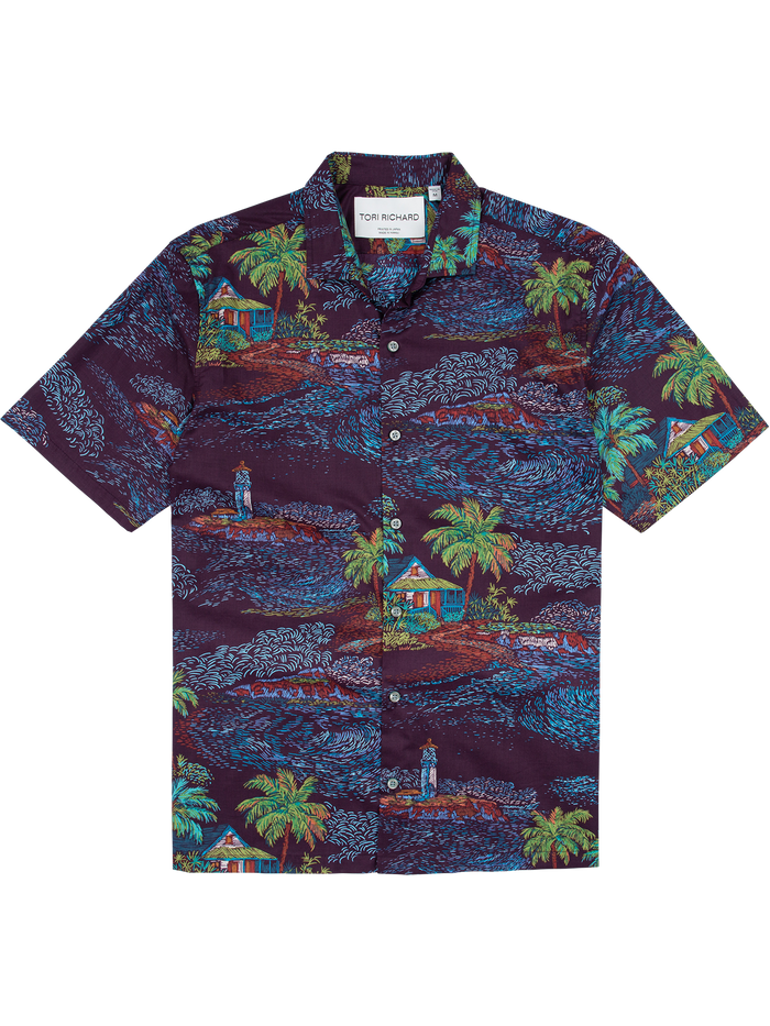 Blue, green, and purple tropical island print short-sleeve shirt, front view.