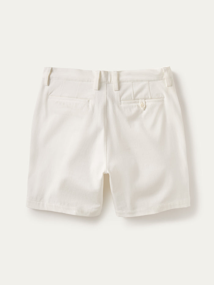 Light solid tailored shorts, rear view, belt loops, two back pockets (one with button).