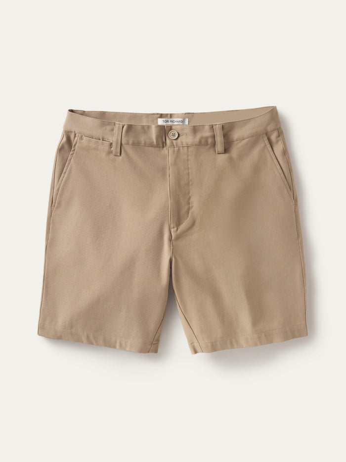 Tan solid shorts, stretch fabric with front pockets, belt loops, and button closure, front view.