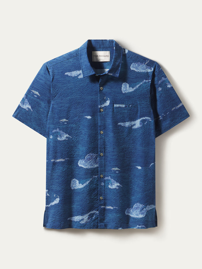 Blue cloud-pattern short-sleeve shirt, polyester, front view.