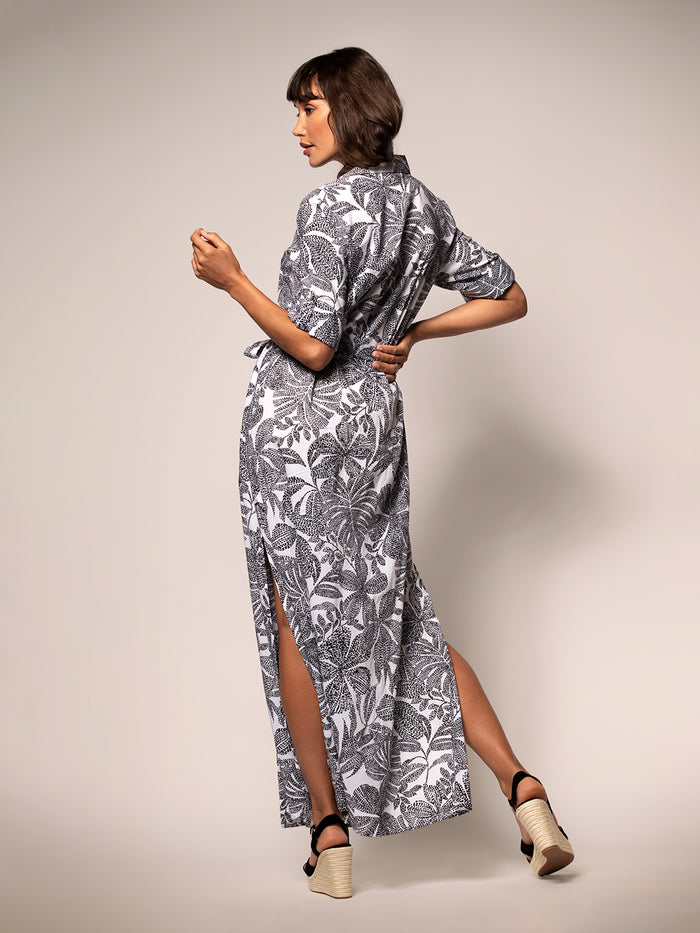 Black and white polka dot floral pattern midi Dress maxi dress with side slit, full-length view.