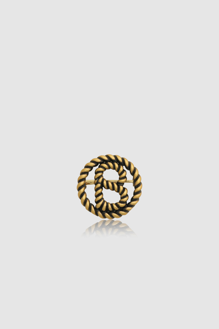 interlock pin brooch in anti gold by buttonscarves front view