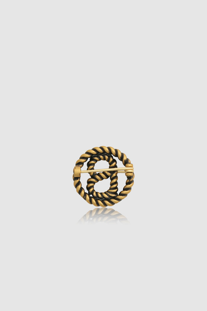 interlock pin brooch in anti gold by buttonscarves back view