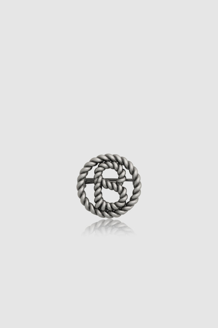interlock pin brooch in anti silver by buttonscarves front view