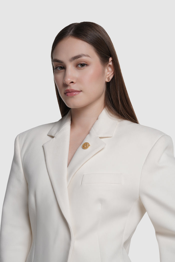 interlock pin brooch in gilding gold by buttonscarves on blazer