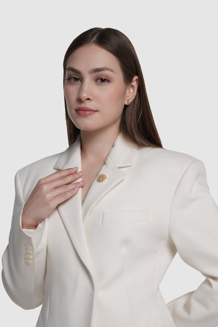 interlock pin brooch in gold by buttonscarves on blazer