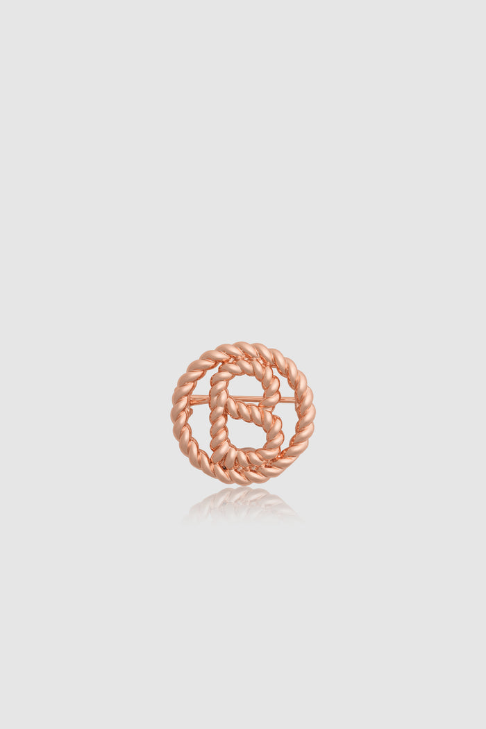 interlock pin brooch in rose gold by buttonscarves front view