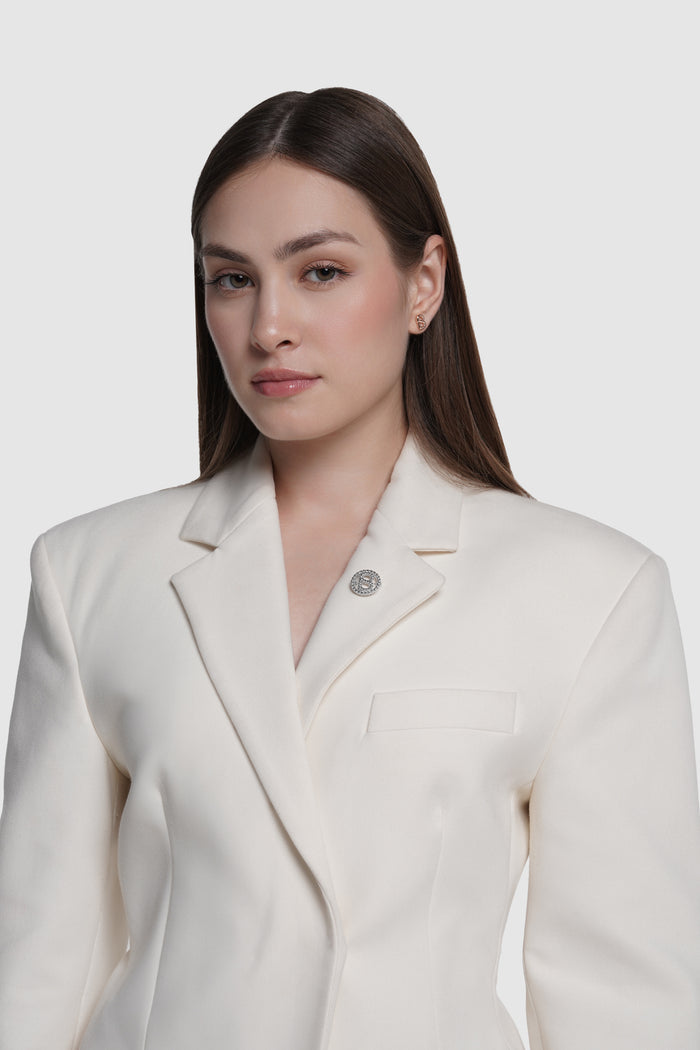 interlock pin brooch in silver by buttonscarves on blazer