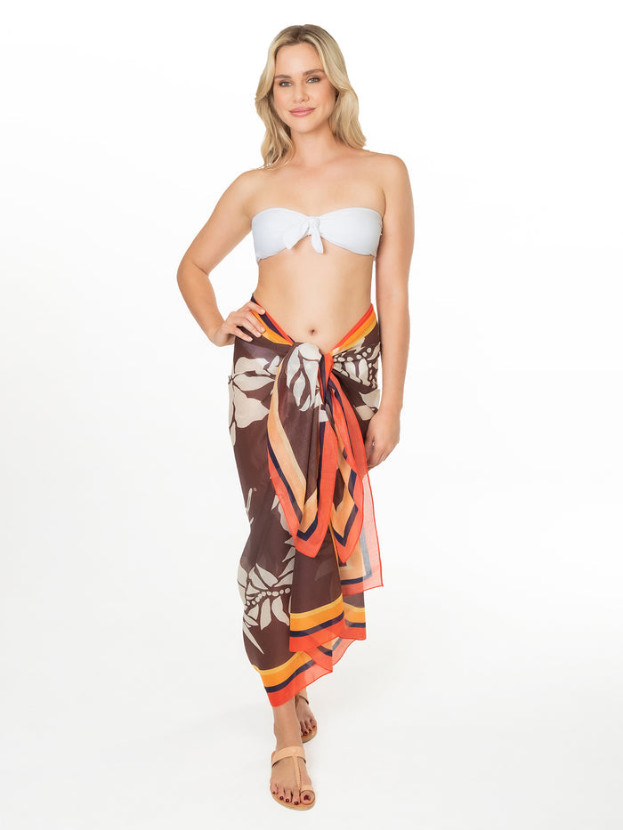 Multicolor abstract-print pareo skirt with white strapless bikini top, front view.