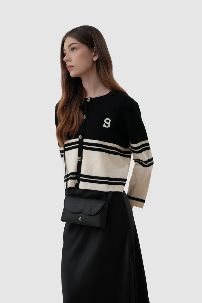 jenny sling bag in black by buttonscarves crossbody carry style