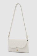 jenny sling bag in broken white by buttonscarves