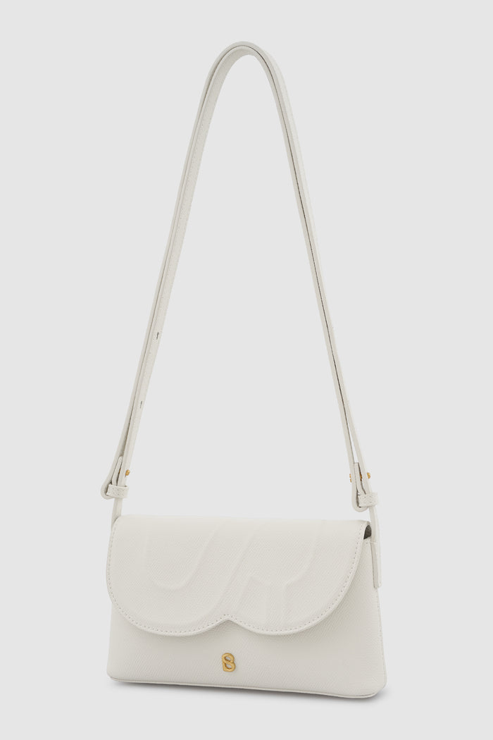 jenny sling bag in broken white by buttonscarves