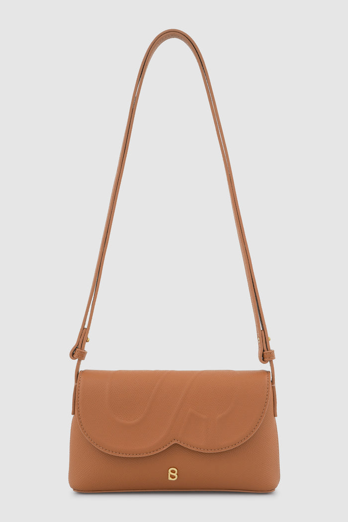 jenny sling bag in tan by buttonscarves front view