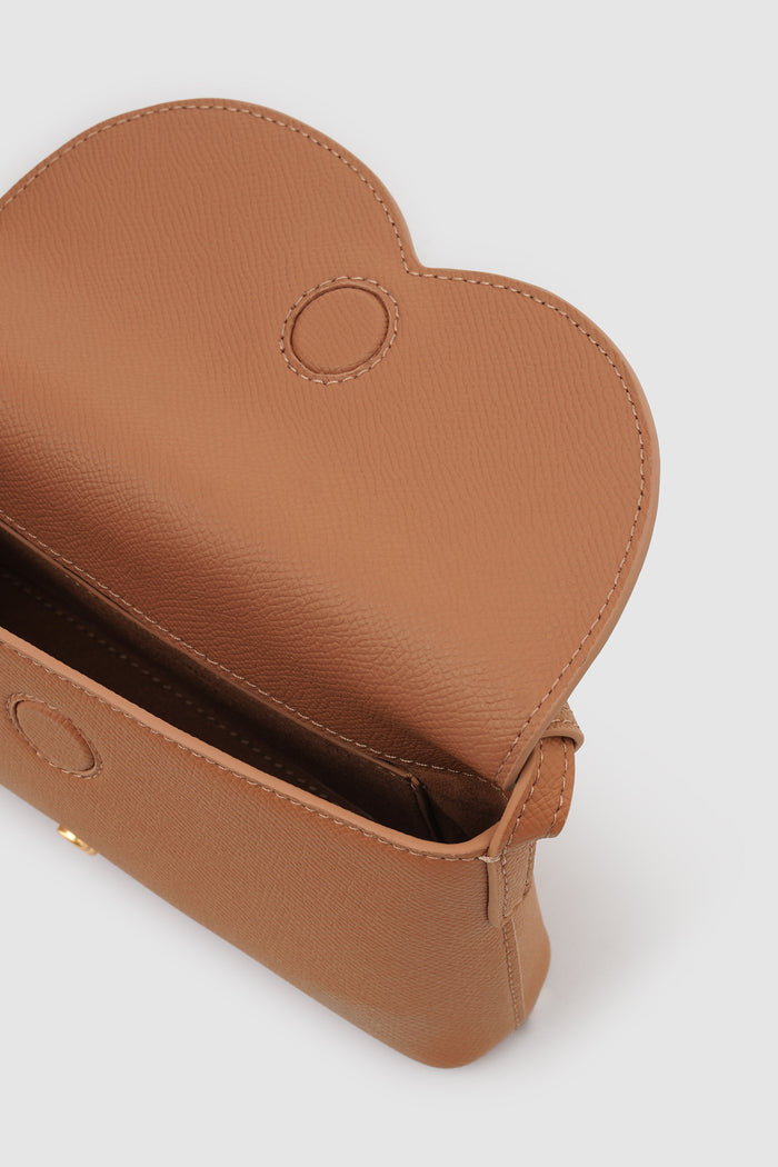 jenny sling bag in tan by buttonscarves interior compartment