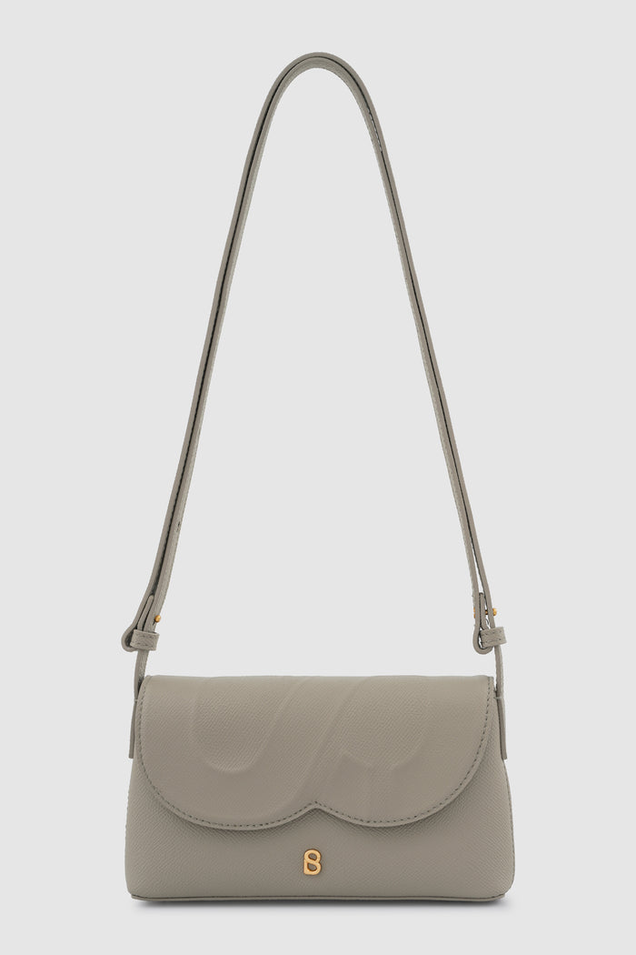 jenny sling bag in taupe by buttonscarves front view