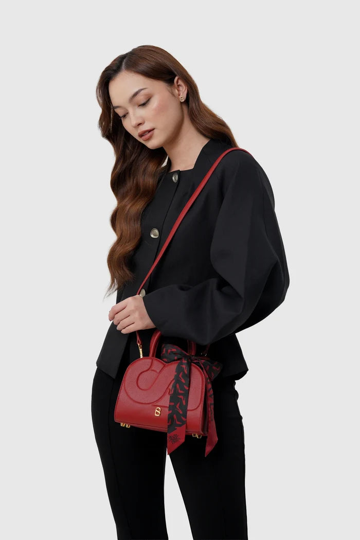 joy bag small in red by buttonscarves x the devil wears prada 2 carried on shoulder