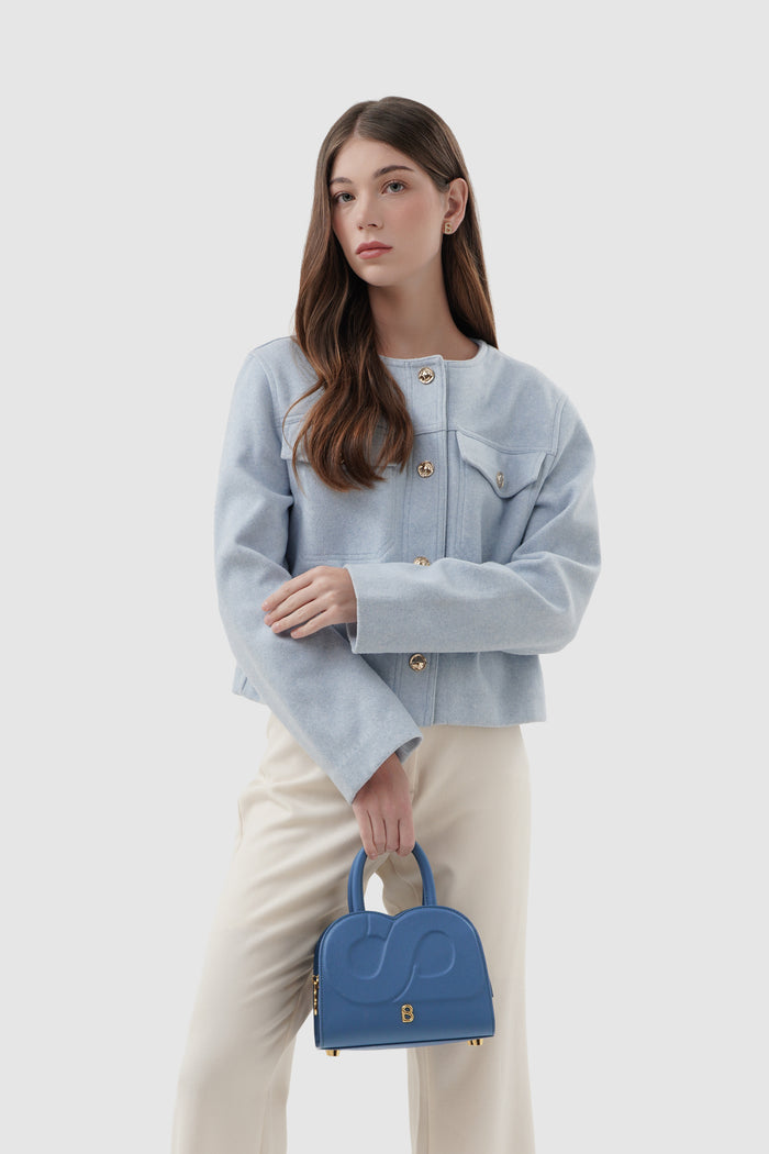 joy bag small with saffiano leather in bluebell by buttonscarves hand carried style