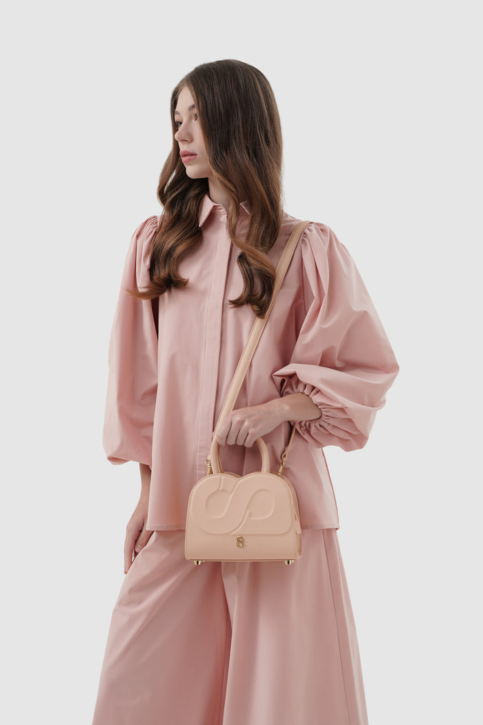 joy bag small with saffiano leather in seaside by buttonscarves carried on shoulder