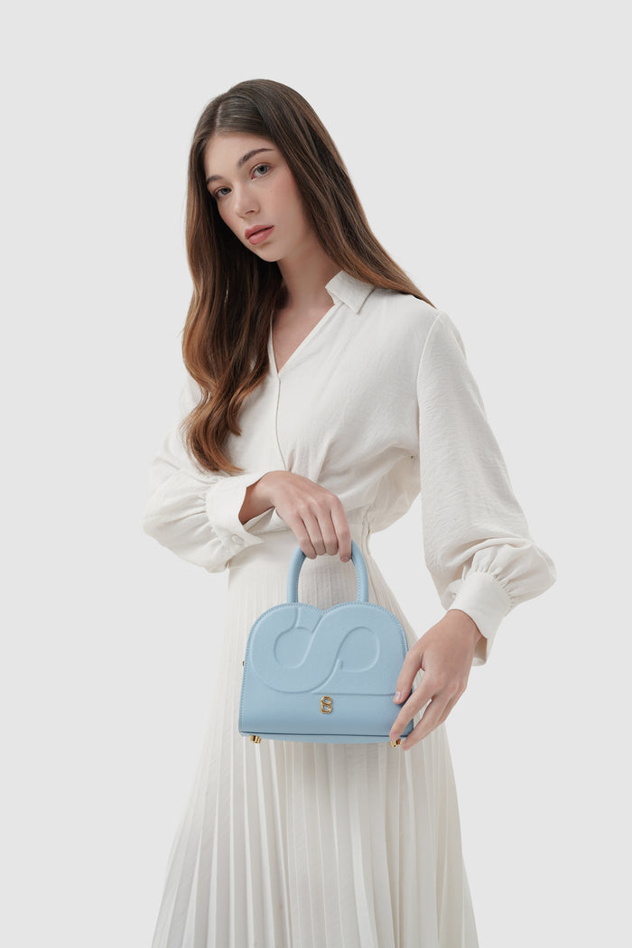 joy bag small with saffiano leather in waterfall by buttonscarves hand carried style