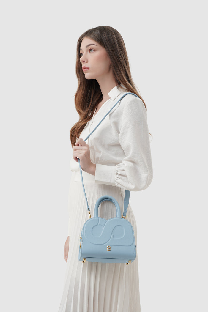 joy bag small with saffiano leather in waterfall by buttonscarves carried on shoulder