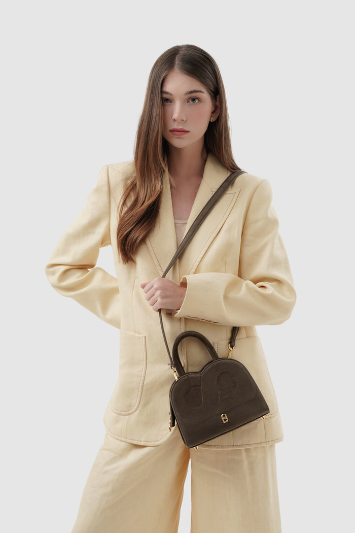 joy bag small with suede leather in dark brown by buttonscarves carried on shoulder