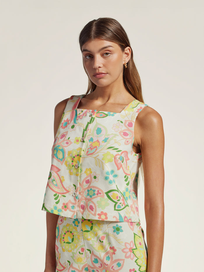 Multicolor Hawaiian floral-print cropped top and skirt set, front view on plain background.