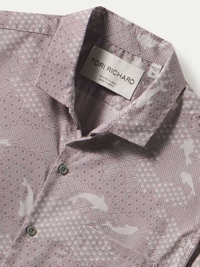 Light purple and white geometric and fish print cotton shirt, shown in a close-up view, label visible at collar or neckline.
