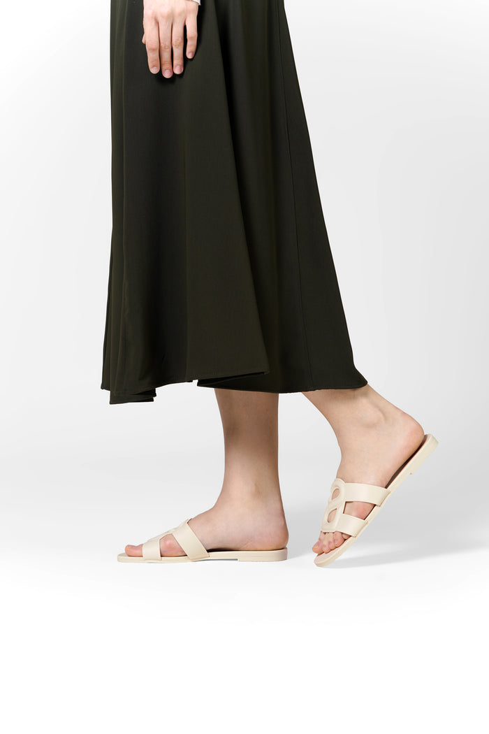 kefi slide sandal in mystic white by buttonscarves worn on feet side view