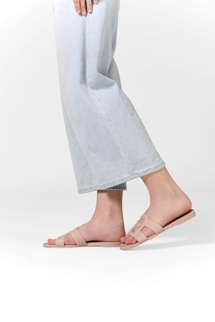 kefi slide sandal in nude pink by buttonscarves worn on feet side view