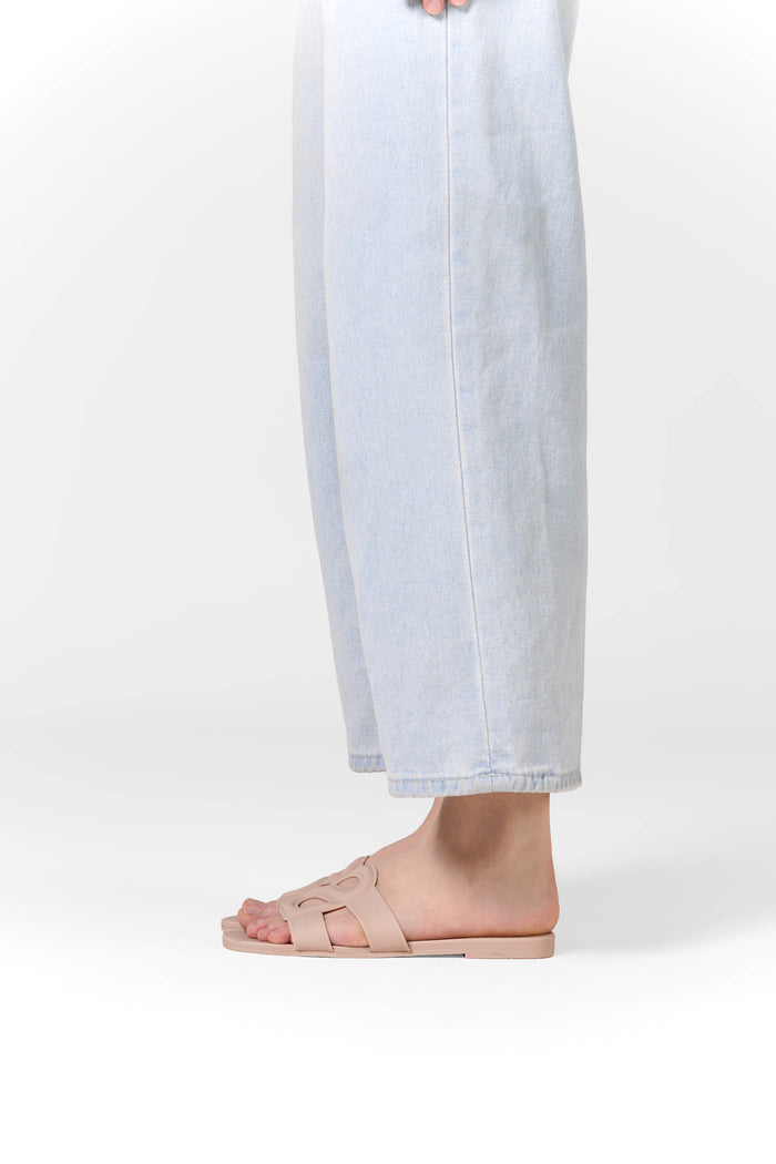 kefi slide sandal in nude pink by buttonscarves worn on feet side view