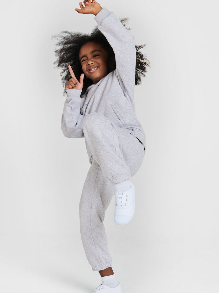 Kids' 365 Midweight Hoodie grey marl 100% organic cotton PPRMNT™ anti-odor worn by playful child
