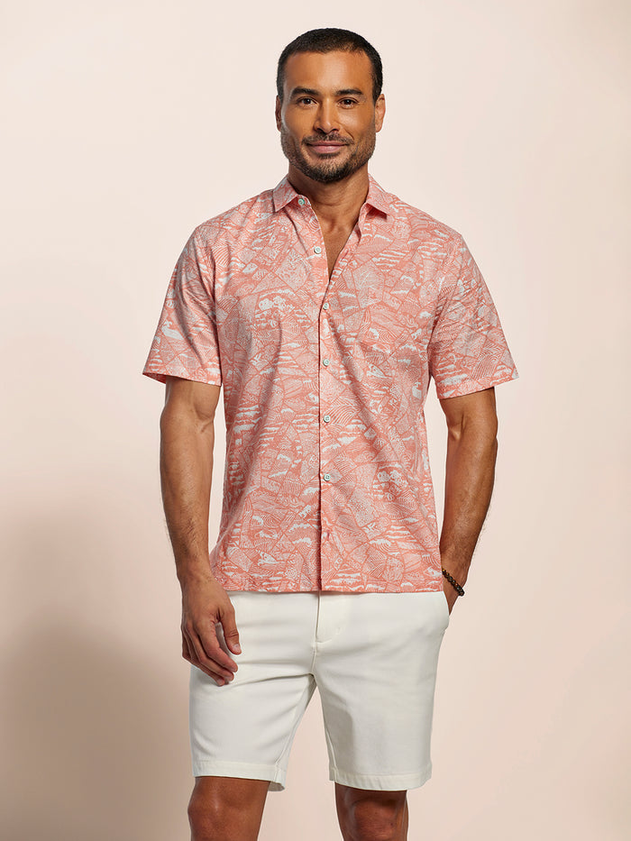 Pink Kintsugi-print short-sleeve shirt with white shorts, front view of model.