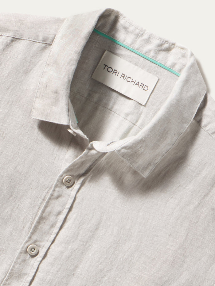 Light gray long-sleeve collared shirt, Oceanside Linen Collection, label visible inside.