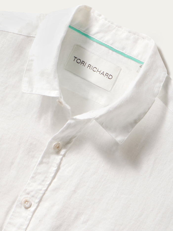 White solid linen long-sleeve shirt with visible collar and TORI RICHARD neck label.