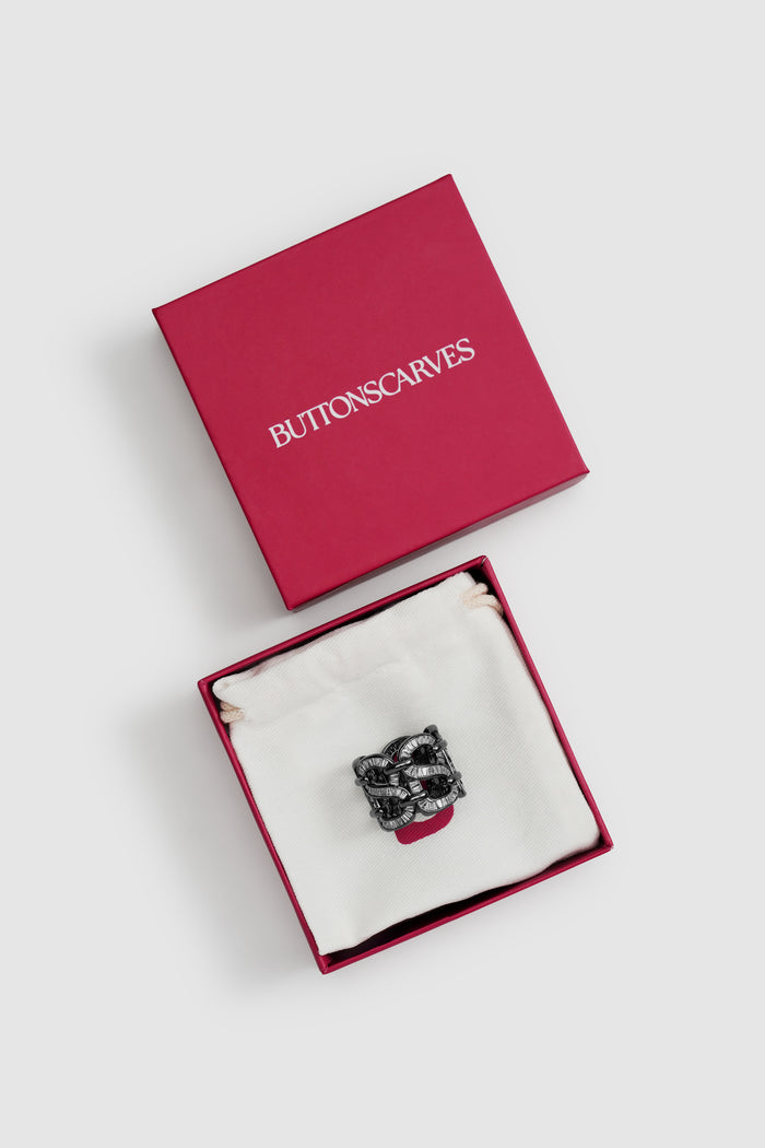 lavish ring brooch in hematite by buttonscarves packaging