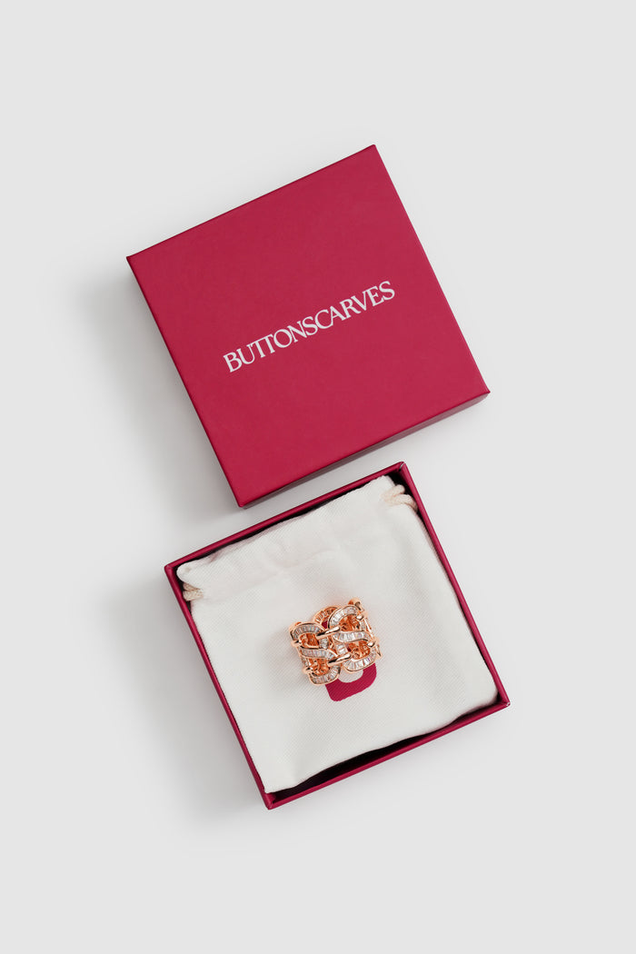 lavish ring brooch in rose gold by buttonscarves packaging