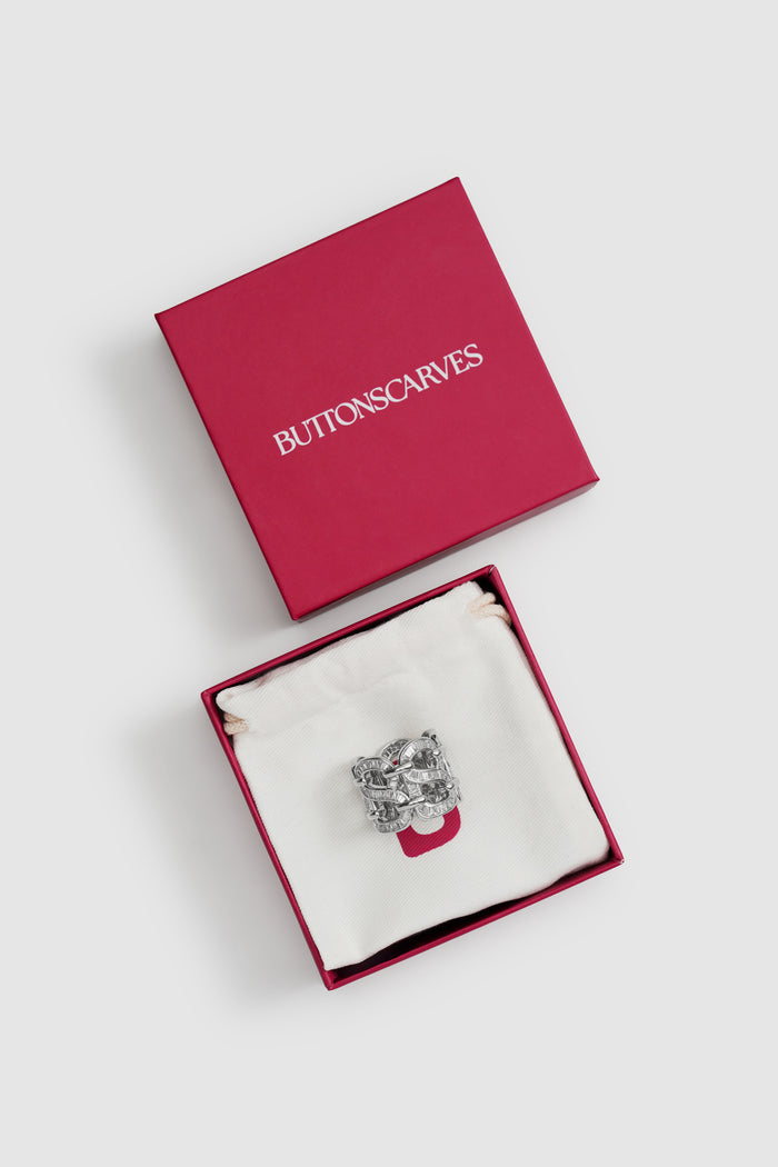lavish ring brooch in silver by buttonscarves packaging