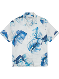 Blue tropical leaf short-sleeve button-up shirt, sand-washed twill, flat lay view.