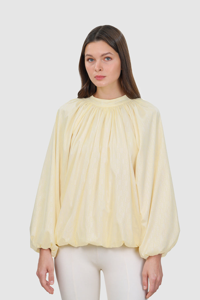 leena cotton ruffle blouse in yellow by buttonscarves front view
