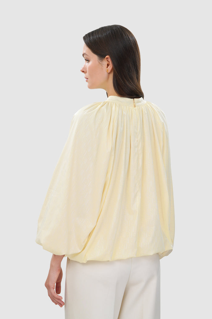 leena cotton ruffle blouse in yellow by buttonscarves back view