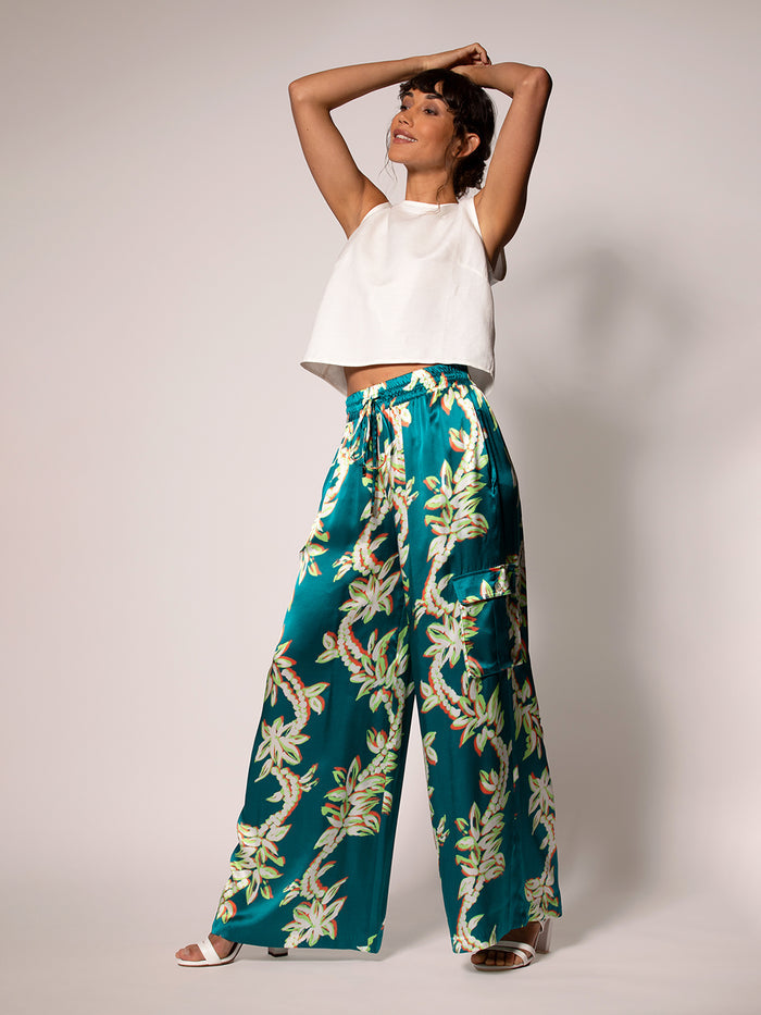 White sleeveless top with floral-print Lei of the Land Nikita Pant, full body front view.